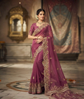 Purple pure organza saree with zardozi and moti work