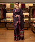 Jamuni purple saree with contrasting pink and geometric patterned border and pallu