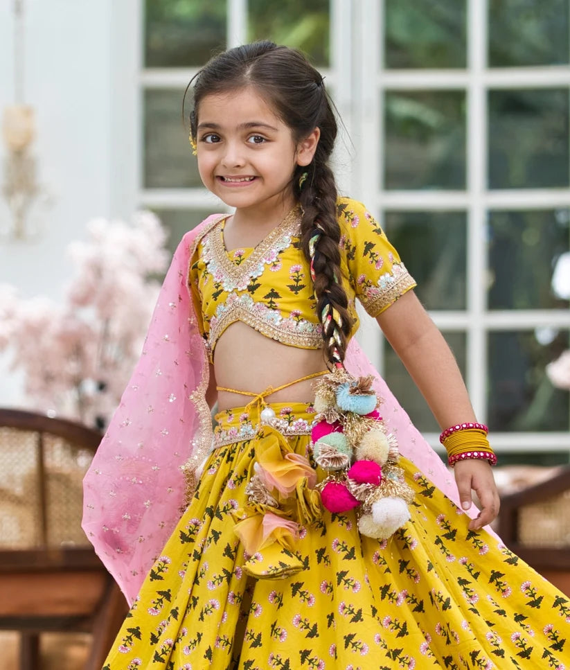 YELLOW PRINTED LEHENGA CHOLI AND ORGANZA DUPATTA