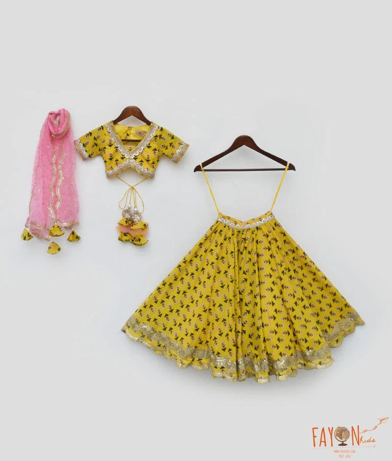 YELLOW PRINTED LEHENGA CHOLI AND ORGANZA DUPATTA