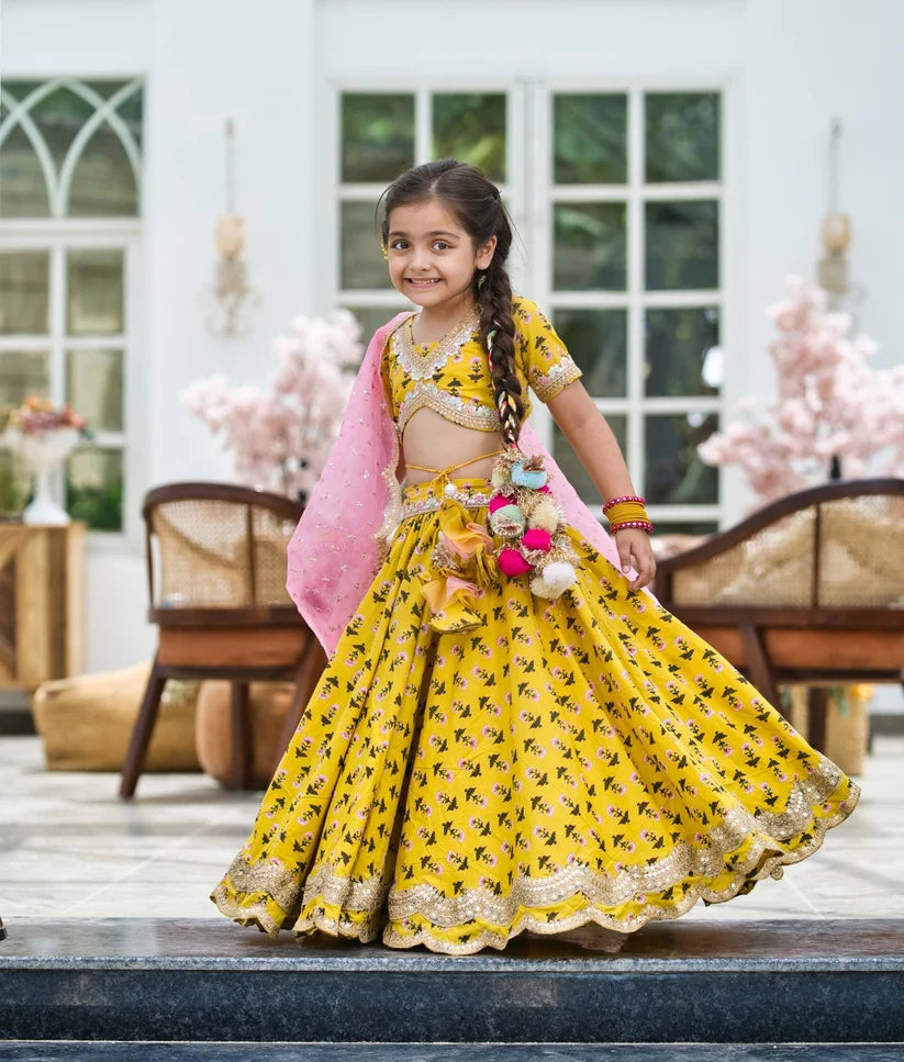 YELLOW PRINTED LEHENGA CHOLI AND ORGANZA DUPATTA
