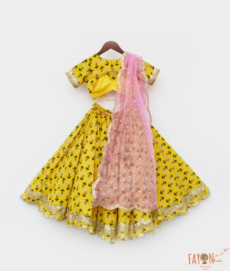 YELLOW PRINTED LEHENGA CHOLI AND ORGANZA DUPATTA