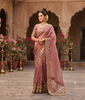 Pink tissue georgette saree with zardozi work and heavy blouse