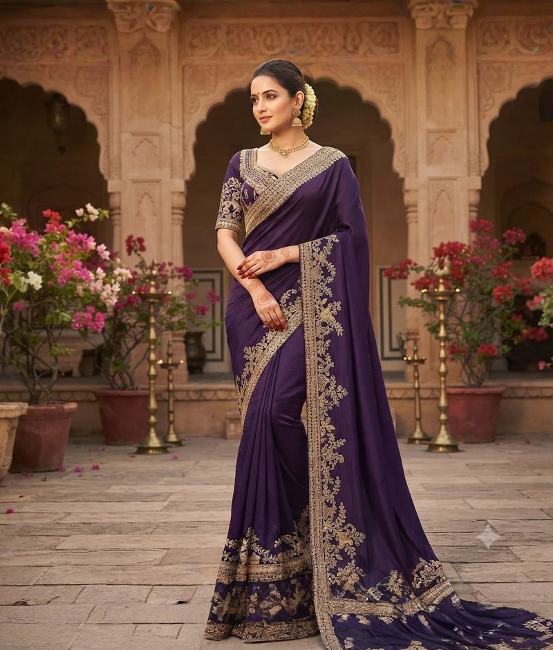 Purple handloom silk saree with zardozi work and a little katdana and sequence detailing