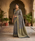 Greyish dark blue Tussar georgette saree with zari weaving